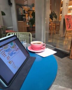 A tablet and a mug in After Half Cafe